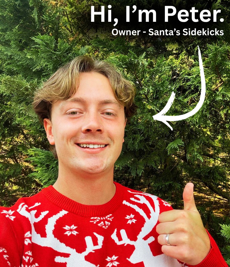 Peter, owner of Santa's Sidekicks, in a red holiday sweater giving a thumbs up